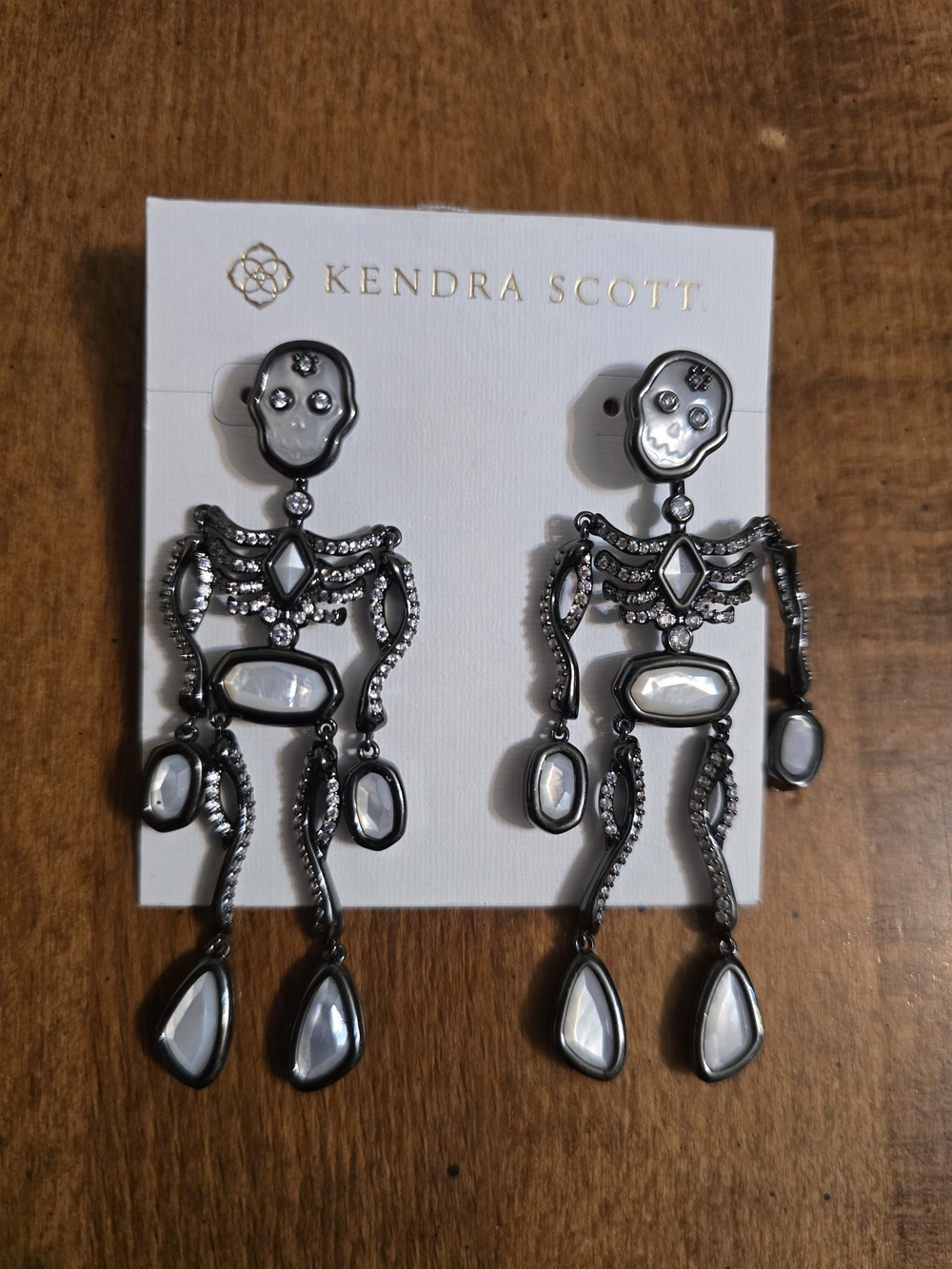 Kendra Scott Gunmetal Skeleton Drop Earrings with White Stones